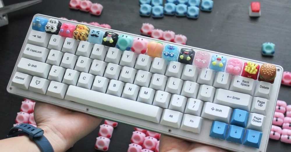 The artist putting small Kirby, waffles, and SpongeBob on your mechanical keyboard